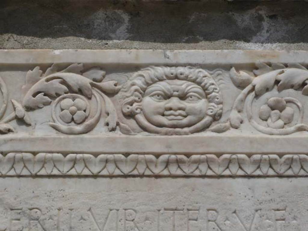 Herculaneum, August 2013. Detail of the carving on the south side of altar to Marcus Nonius Balbus. Photo courtesy of Buzz Ferebee.